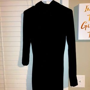 Sexy turtle neck black dress.